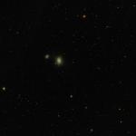 Galàxia M85 i altres (NGC4394 a l'esquerre, NGC4293 a la dreta).